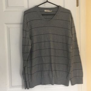 gray sweater with navy stripes